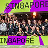 Victorious women's rugby team celebrating win at Singapore HSBC Women's Sevens tournament.