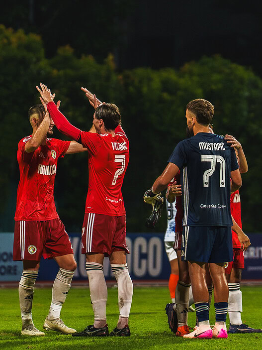 Balestier Tigers players celebrating during a football match against Albirex.