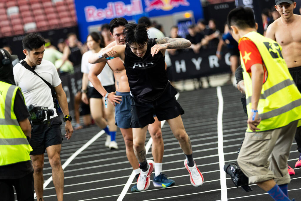 Athlete jumping at AIA HYROX Singapore, showcasing determination and athleticism.