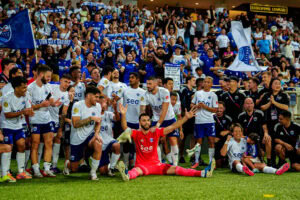 Singapore football team celebrates league title after Tampines draw victory.